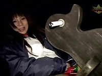 Asian girl on a rocking horse