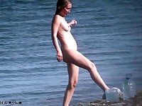Nudist on her knees